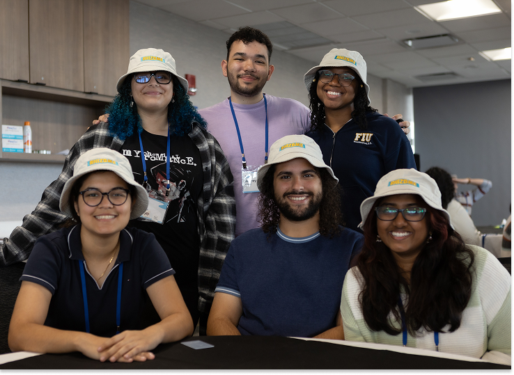Rhizome Fellows smiling while gathered together